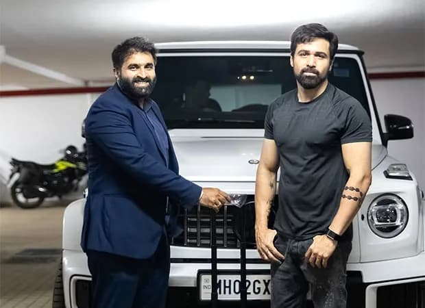 Emraan Hashmi posing beside his new Mercedes-Benz AMG G63 outside his Mumbai residence