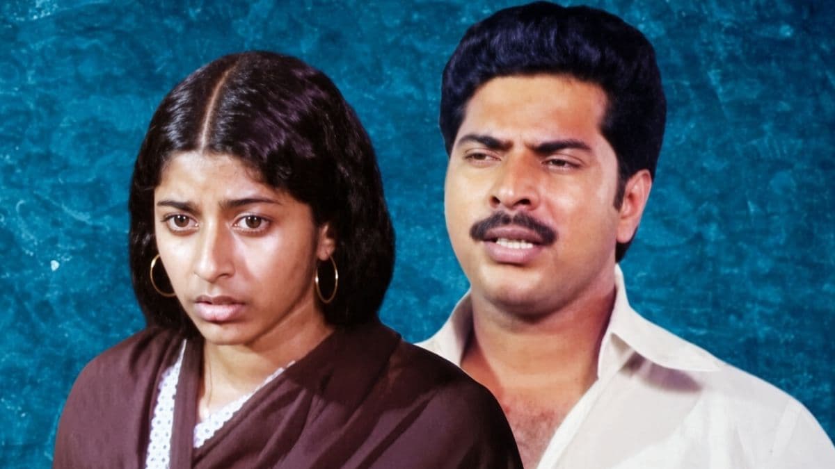 A black and white still from the Malayalam film Yavanika showing a young Mammootty in a police uniform during an investigation scene.