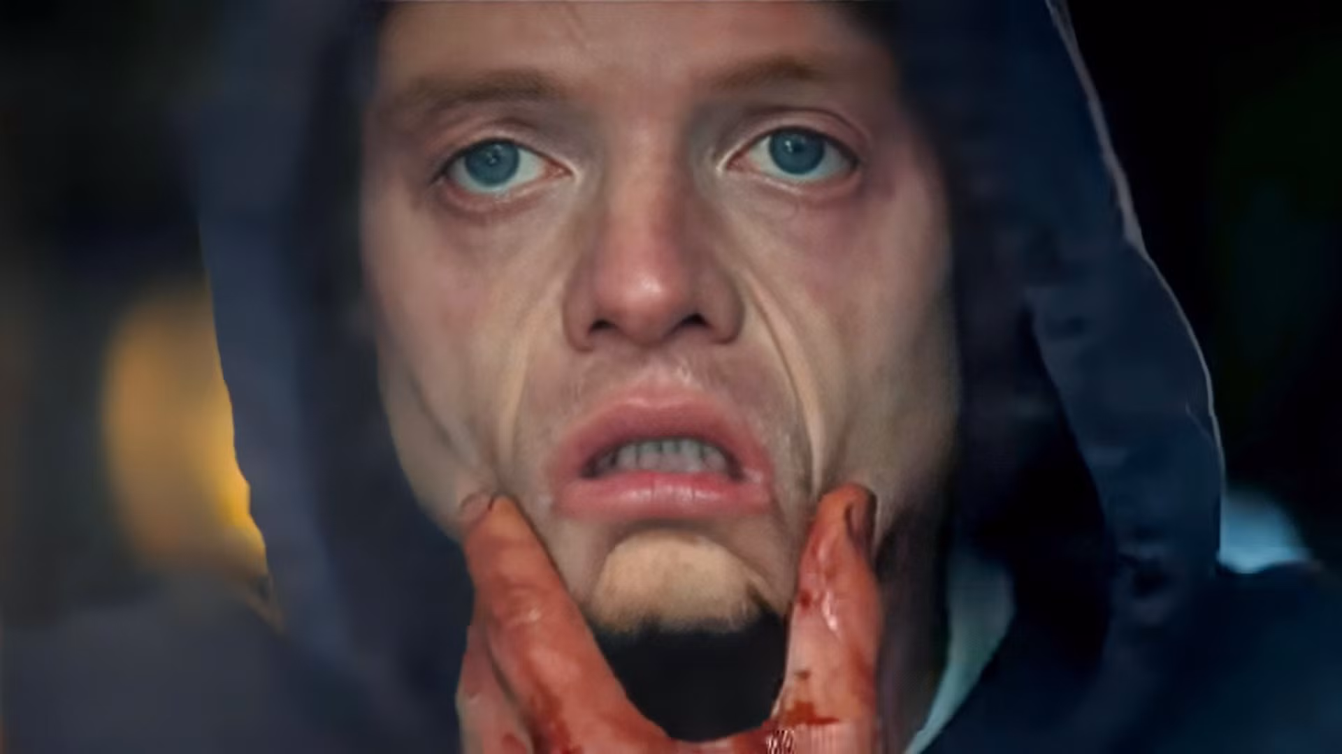 Promotional image for the DC Studios film Clayface showing the villain's clay-like transformed face.