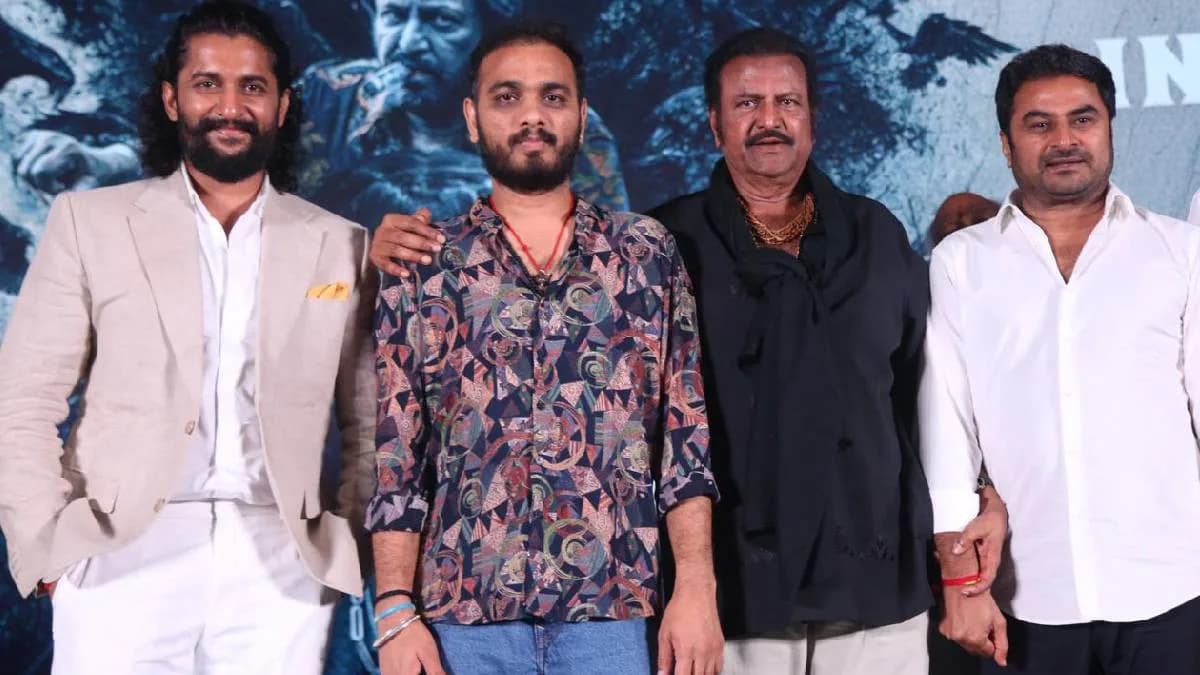 Nani and Mohan Babu stand together on the red carpet at the Media Mulakat for ‘The Paradise’