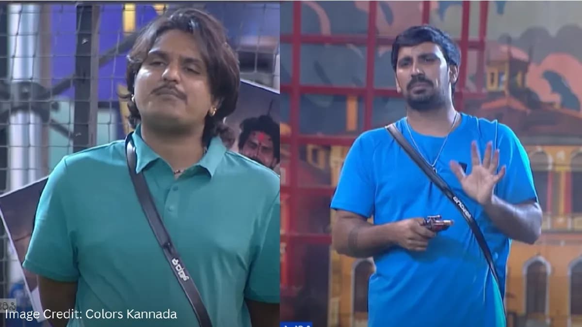 Bigg Boss Kannada 13 contestants Jagadeesh and Kiran Shastry in a heated conversation inside the show's kitchen area.