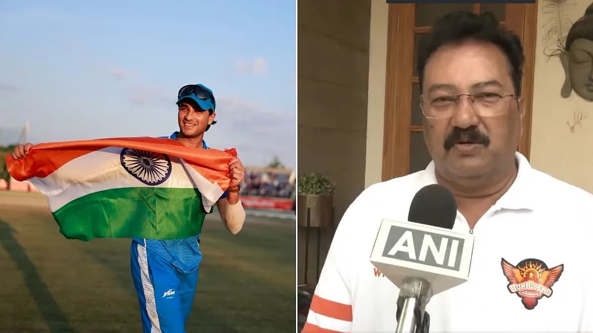 Raj Kumar Sharma in an SRH jersey standing outside a house, speaking to reporters after India's Asian Games 2026 gold medal win.