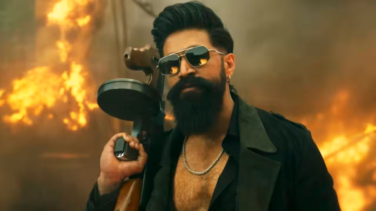 Yash in a still from the film Toxic, standing in character as the box office numbers for the film are discussed