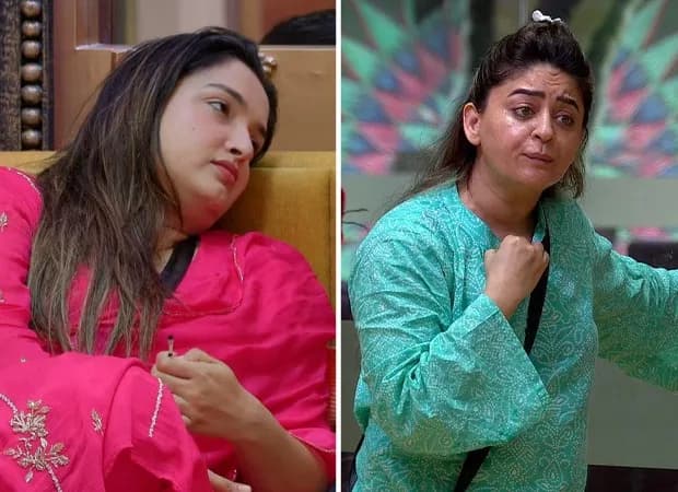 Aamrapali Dubey and Mahhi Vij standing near a chair in the Bigg Boss 20 house, both looking at each other with tension in their expressions.