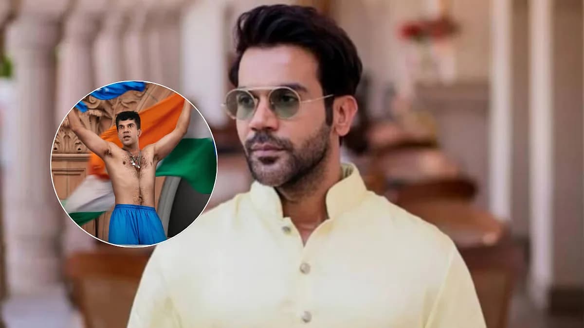 Rajkummar Rao in character as Sourav Ganguly, shirtless, standing on a balcony
