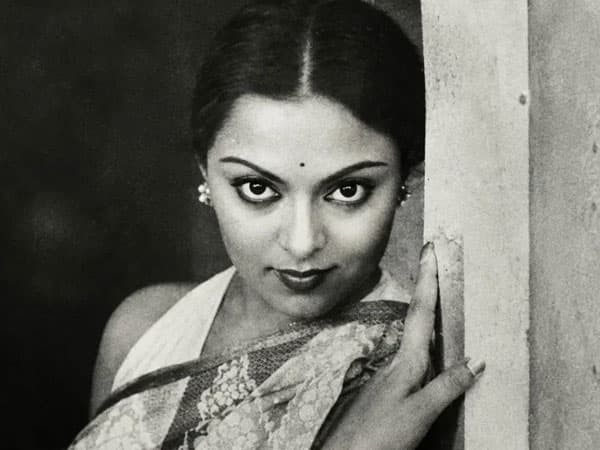 Black-and-white portrait of veteran Bengali actress Mithu Mukherjee, smiling, with her name overlay.
