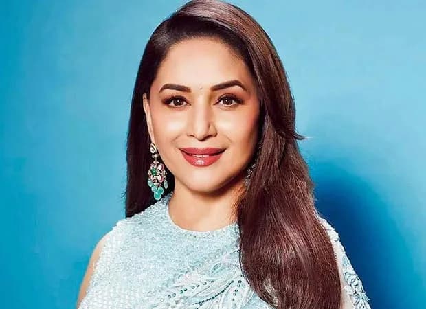 Madhuri Dixit smiling in a promotional photo for Madhusudan Frozen brand campaign