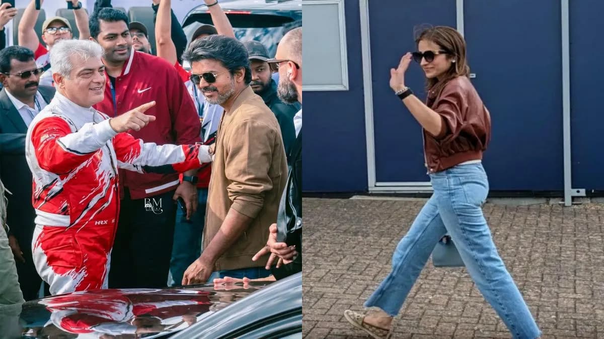Vijay standing at the Silverstone racing circuit gallery with Ajith Kumar and Trisha Krishnan nearby, London.