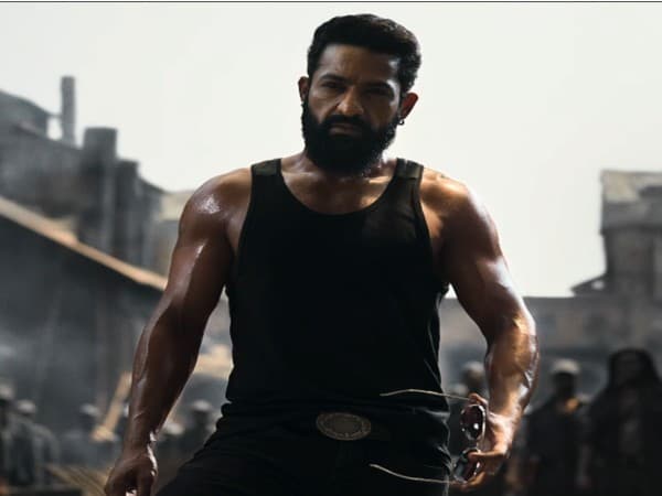 Jr NTR in a period costume performing a stunt on the Dragon film set.