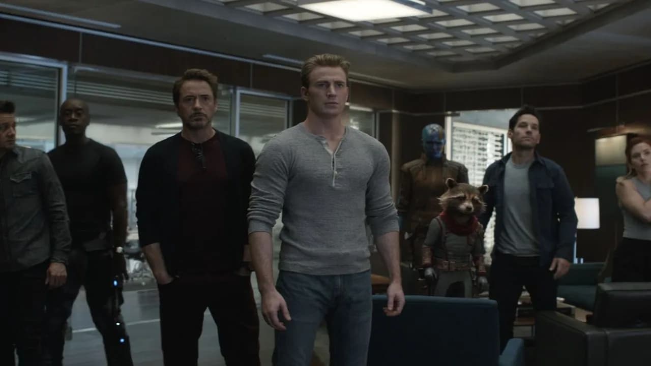 Crowd of moviegoers lining up outside a theater for the Avengers Endgame encore screening in India