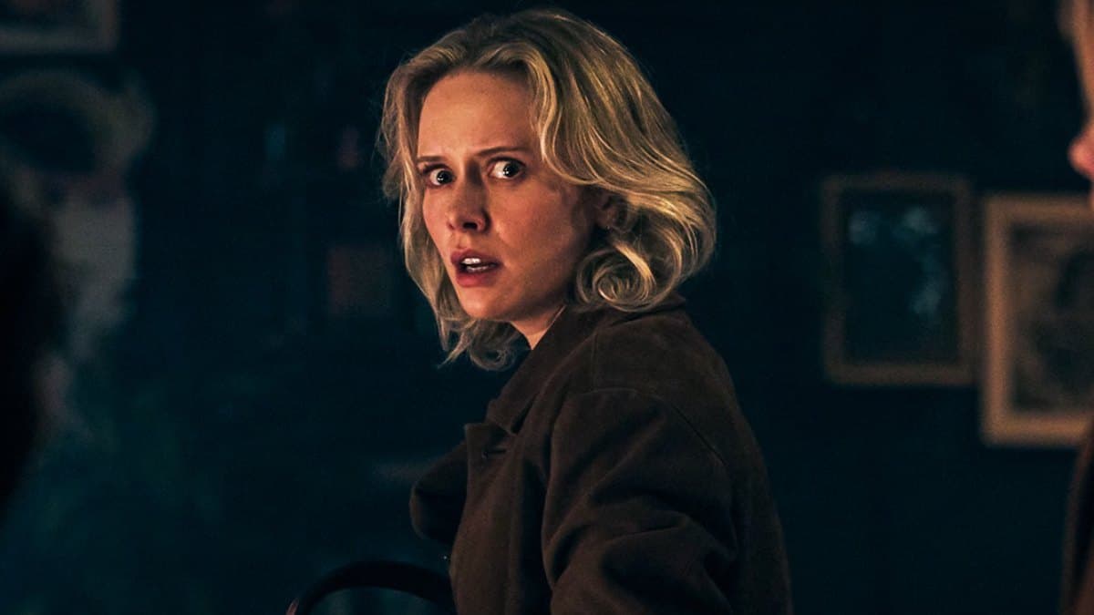 Promotional still from Insidious: Out of the Further showing a dark, spirit-filled scene from the horror sequel