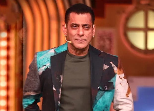 Salman Khan speaking during a Bigg Boss 20 episode, seated in the living room with contestants.