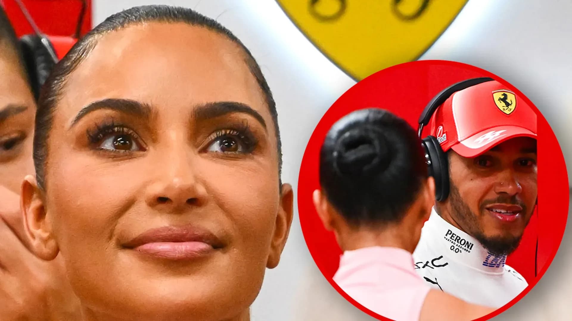 Kim Kardashian in a sheer pink dress at the Singapore Grand Prix, smiling at Lewis Hamilton.