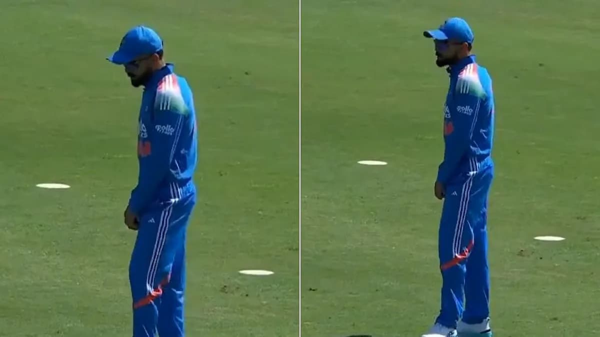 Virat Kohli smiling and dancing at the cover while fielding during the India vs West Indies ODI in Thiruvananthapuram.