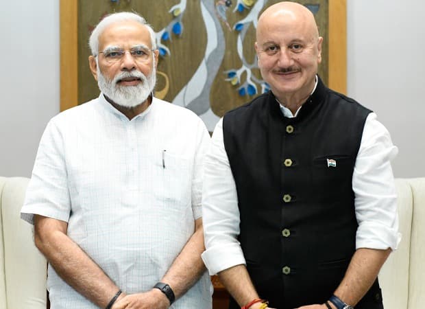 Anupam Kher smiling at a public event