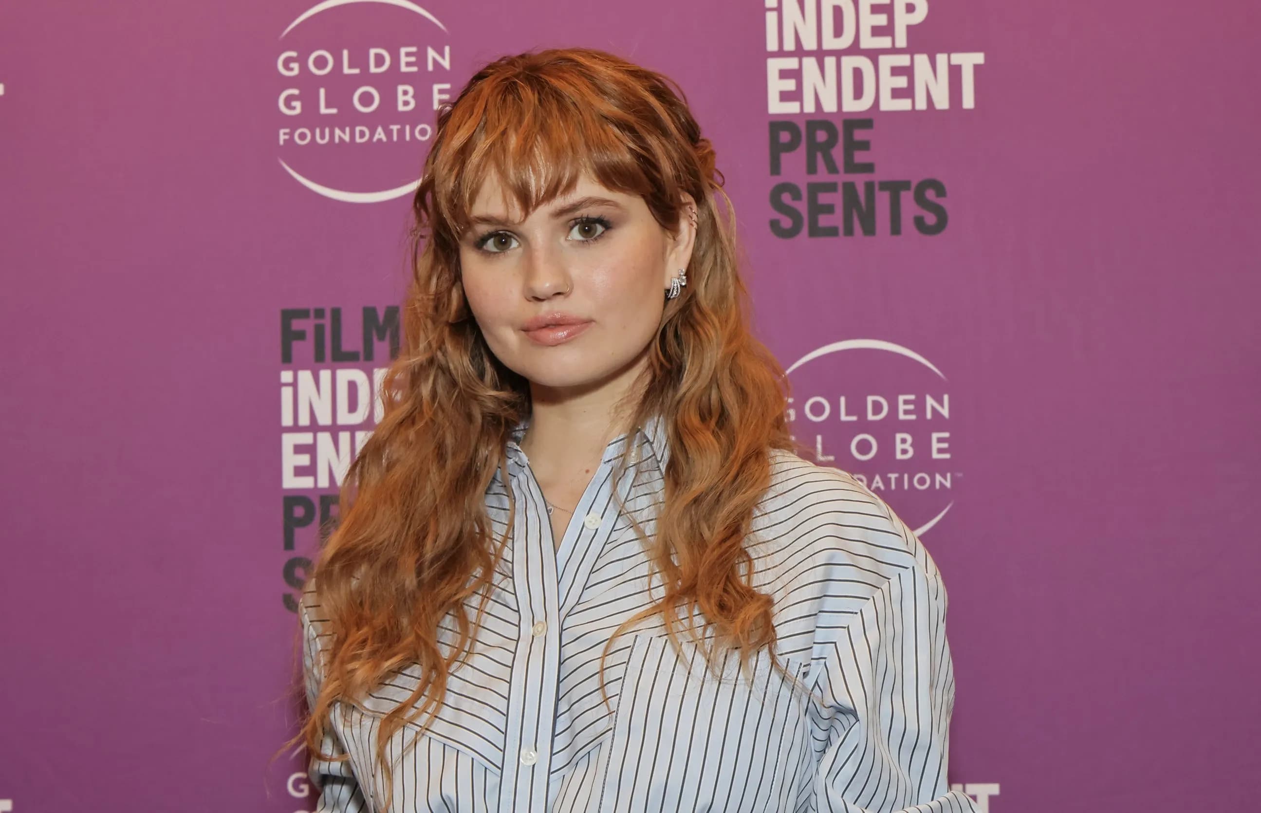 Debby Ryan smiling at a public event