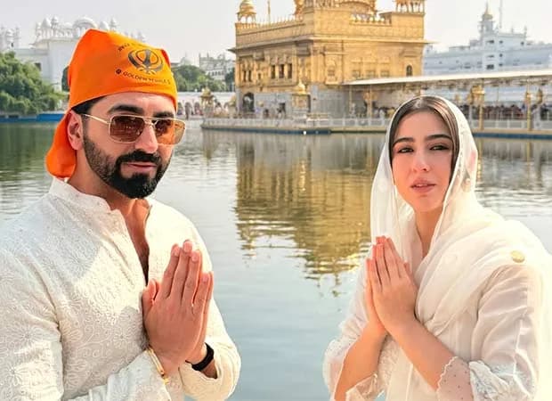 Ayushmann Khurrana and Sara Ali Khan posing together outside the Golden Temple in Punjab during Dussehra