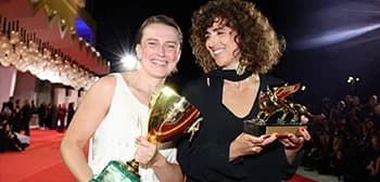 Red carpet and Golden Lion trophy display at the Venice Film Festival awards ceremony