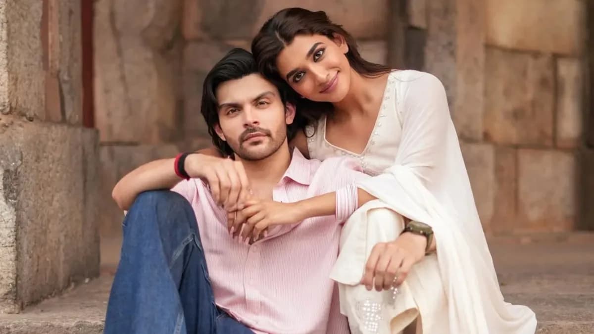 Aafiya Sayed and Veer Pahariya on set, smiling at each other mid-shot