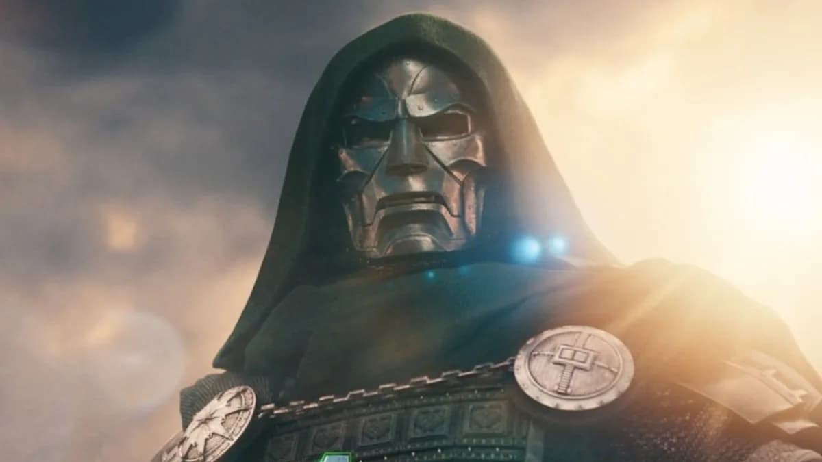 A dramatic new poster for Avengers: Doomsday showing Doctor Doom standing amidst swirling storm clouds, flanked by the Latverian Witches in dark robes, with the title in bold red letters.