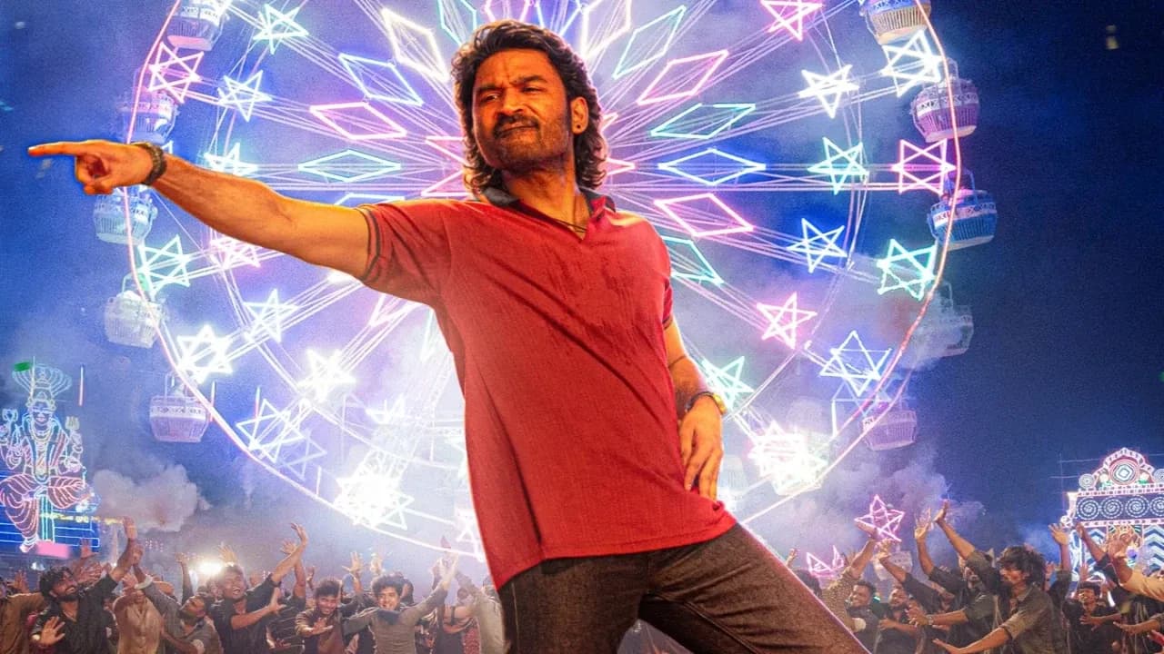 A new poster for Om: Chapter 1 featuring Dhanush and Mammootty standing side by side in intense poses.