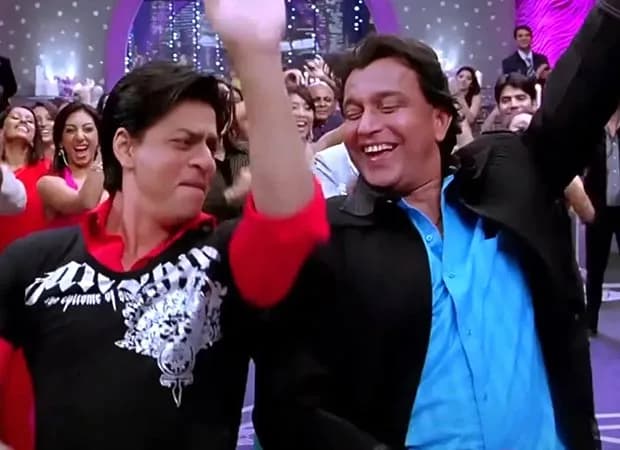 Mithun Chakraborty being greeted by crew on the Om Shanti Om set during the filming of Deewangi Deewangi.