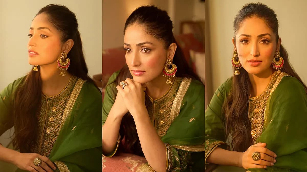 Yami Gautam in a green kurta set with gold embroidery, wearing gold jhumkas and holding a dupatta.