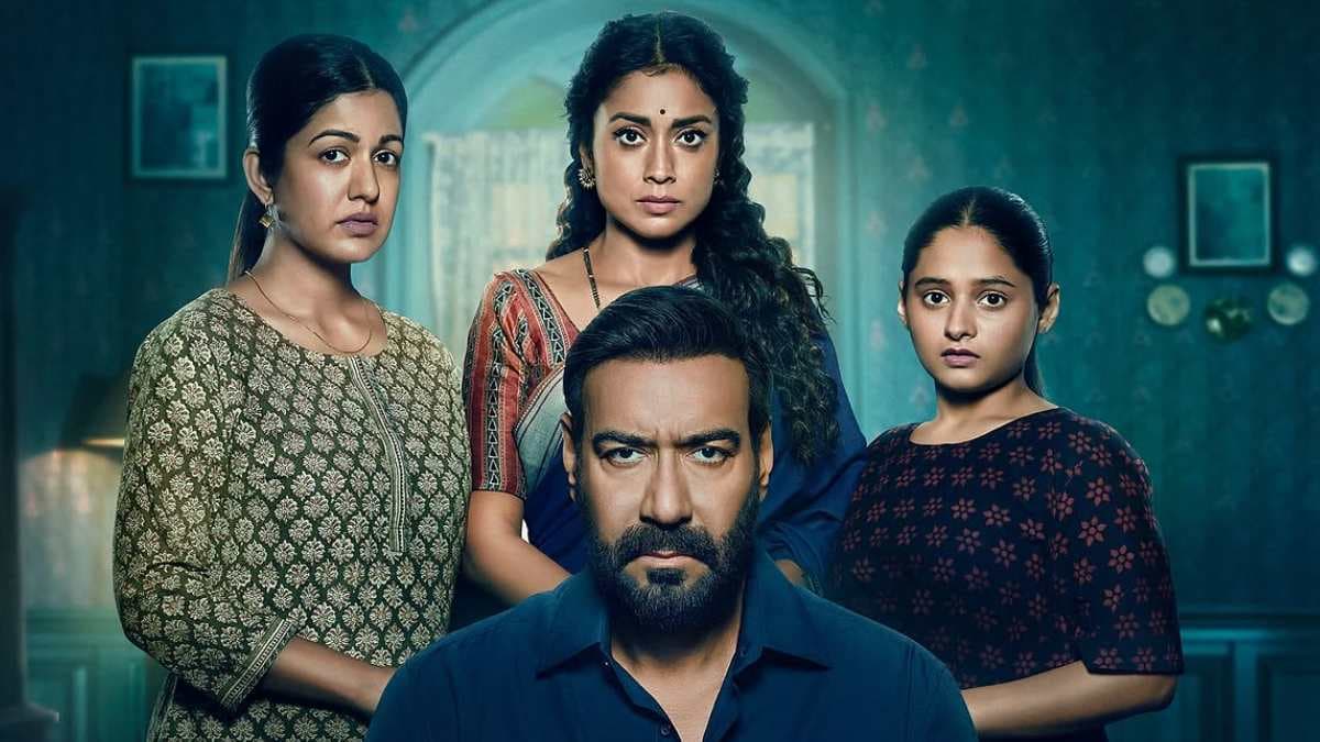 Ajay Devgn as Vijay Salgaonkar in Drishyam: The Conclusion, staring into the distance with calm intensity