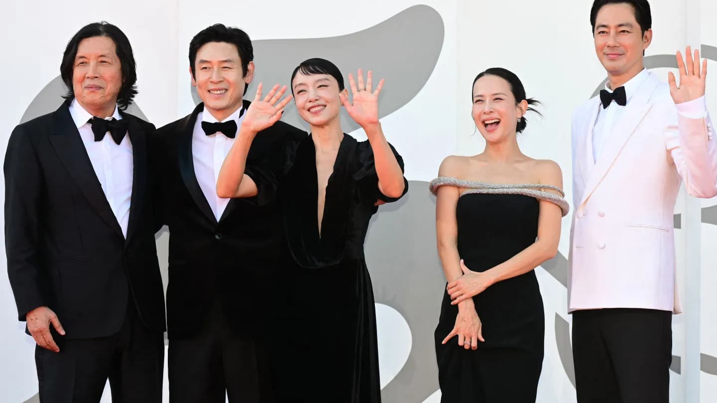 Cast and crew of Possible Love applauding during the film's standing ovation at the Venice Film Festival
