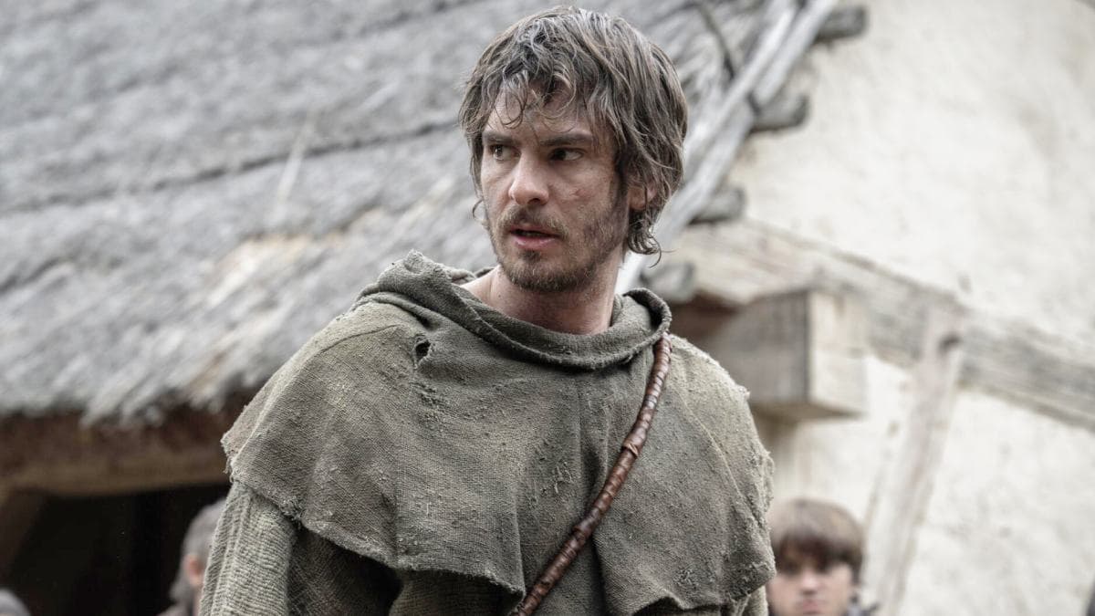 Andrew Garfield in period costume as a 14th-century English plowman in a scene from The Uprising.