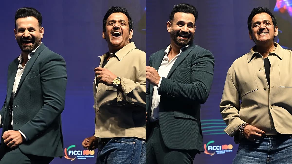 Ravi Kishan and Irfan Pathan performing the viral dance step on stage at the FICCI Frames 2026 conference in Mumbai.
