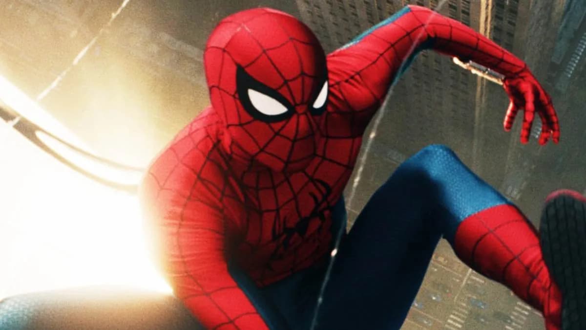 Tom Holland as Spider-Man in a dramatic pose against a city skyline, mid-swing.