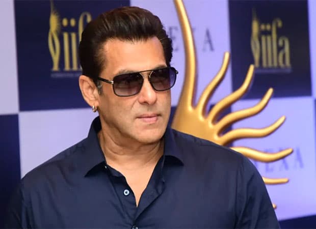 Salman Khan smiling in a promotional photo referencing his IIFA appearances
