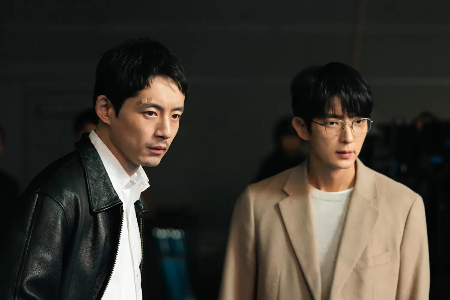 Promotional still from 'kiDnap Game' featuring Kentaro Sakaguchi and Lee Joon-gi in a tense, high-stakes scene