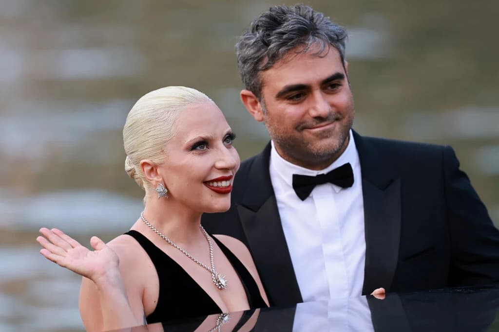 Lady Gaga photographed outdoors in San Francisco, reportedly with her newborn child, alongside fiancé Michael Polansky.