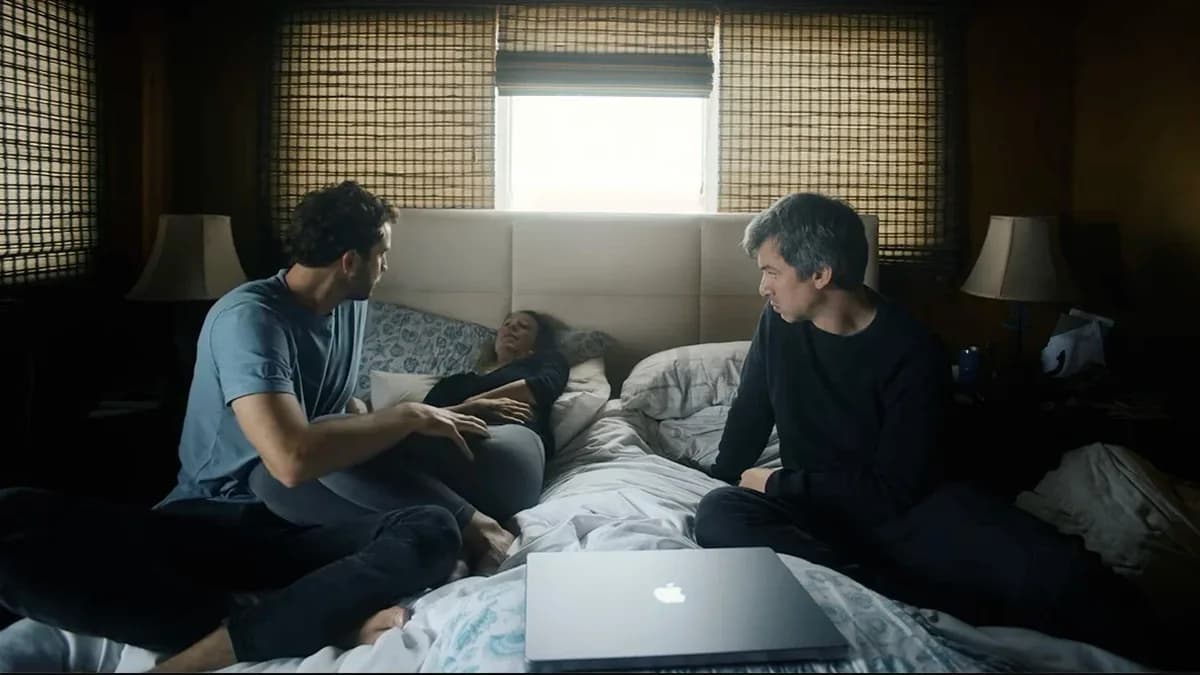 A still from the You Can See Everything trailer showing Elizabeth Holmes in conversation with filmmaker Nathan Fielder.