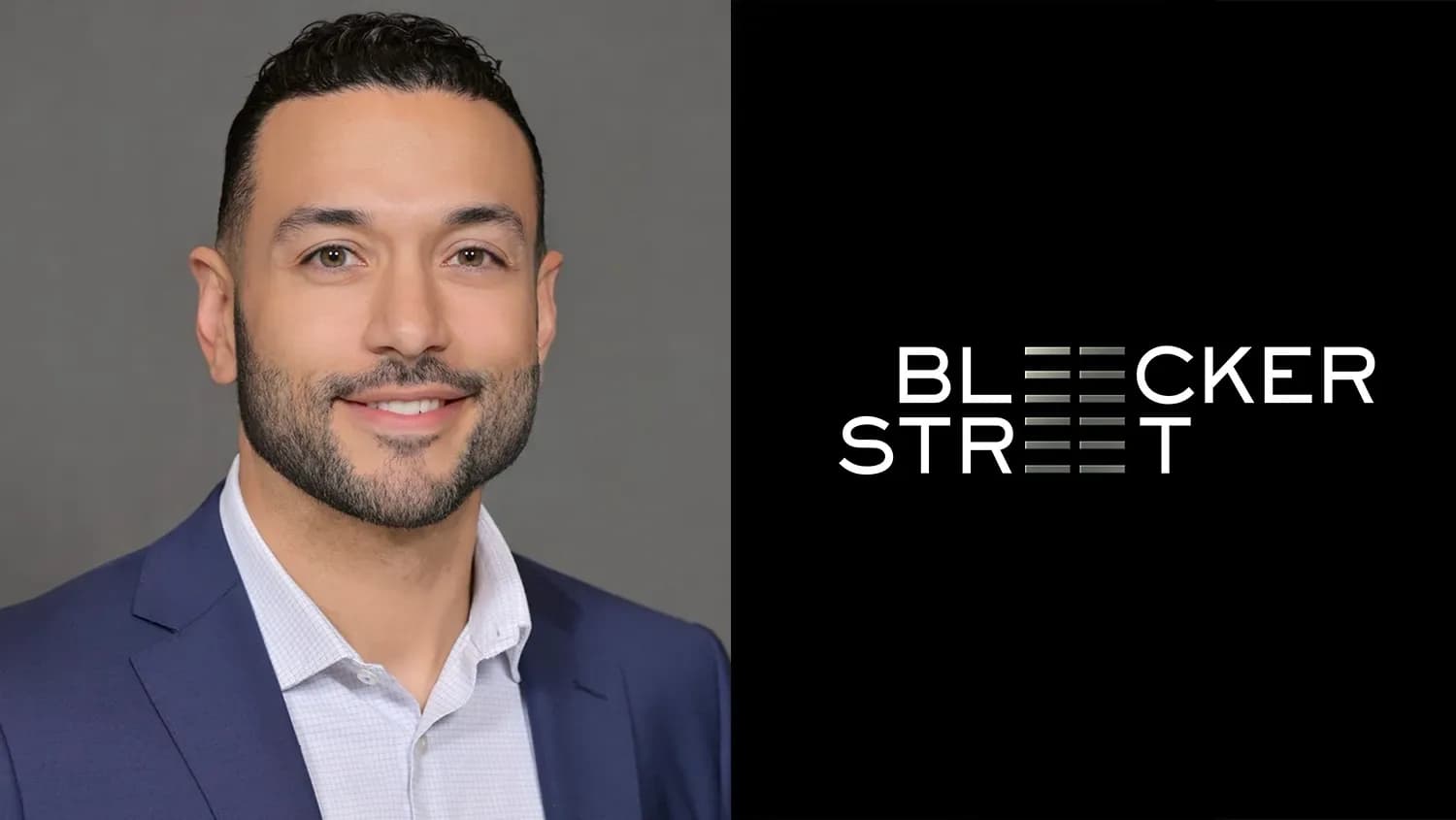 Frank Martinez standing beside the Bleecker Street logo at a press announcement