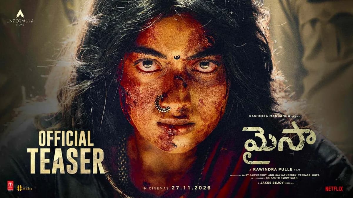 Rashmika Mandanna in rugged tribal attire fighting with a spear in a dense forest, as seen in the Mysaa teaser.