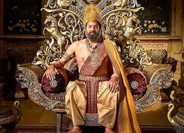 Arun Govil in royal attire as King Dashrath, staring into the distance with solemn dignity