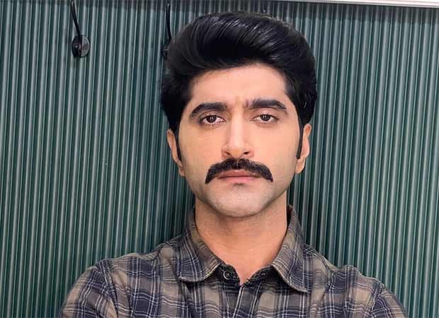 Suhail Nayyar in a muscular look with a moustache, dressed as a spy for Udta Teer