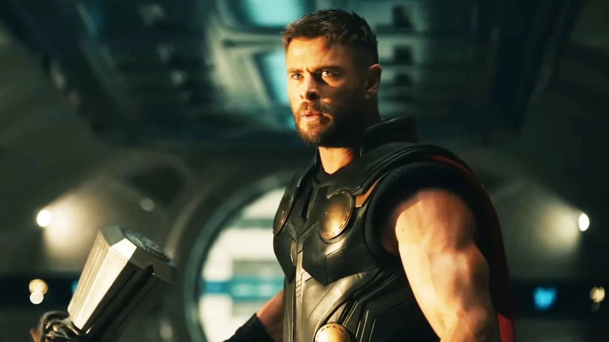 A promotional image of the Avengers team gathered in a fractured multiverse setting, facing off against Doctor Doom.