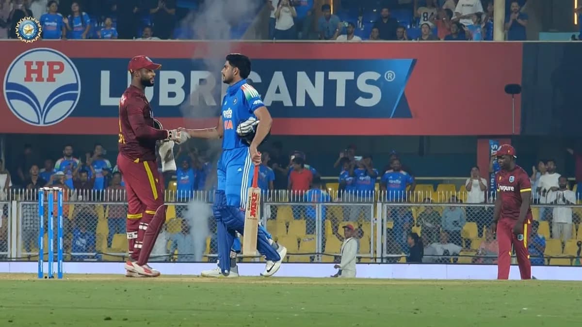 Shubman Gill raising his bat after scoring 223 runs in the Guwahati ODI against West Indies