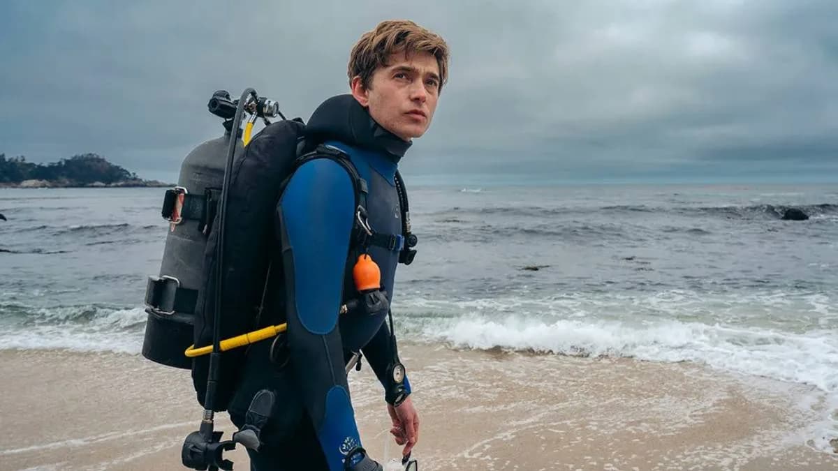 Austin Abrams in a tense scene from the survival thriller Whalefall, trapped inside a whale's body