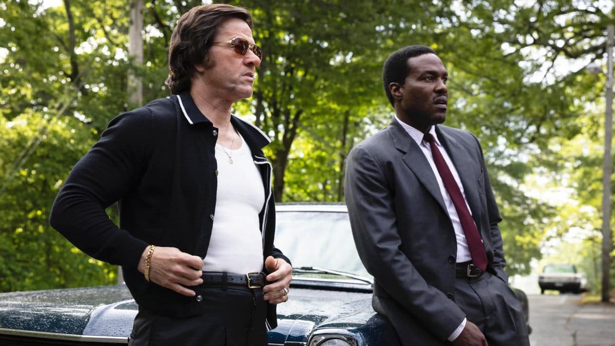 Promotional image of Mark Wahlberg and Yahya Abdul-Mateen II from the crime thriller By Any Means