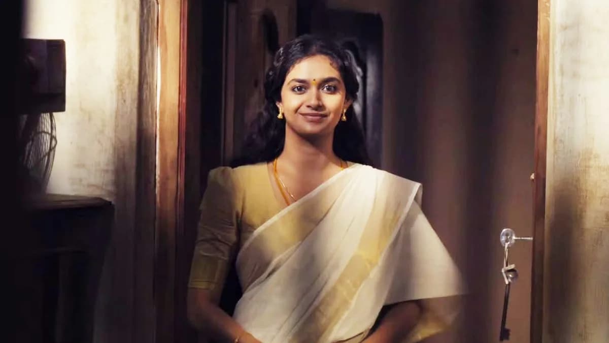 Vijay Sethupathi in a still from Baththa alongside a poster image of Keerthy Suresh from Dorothy