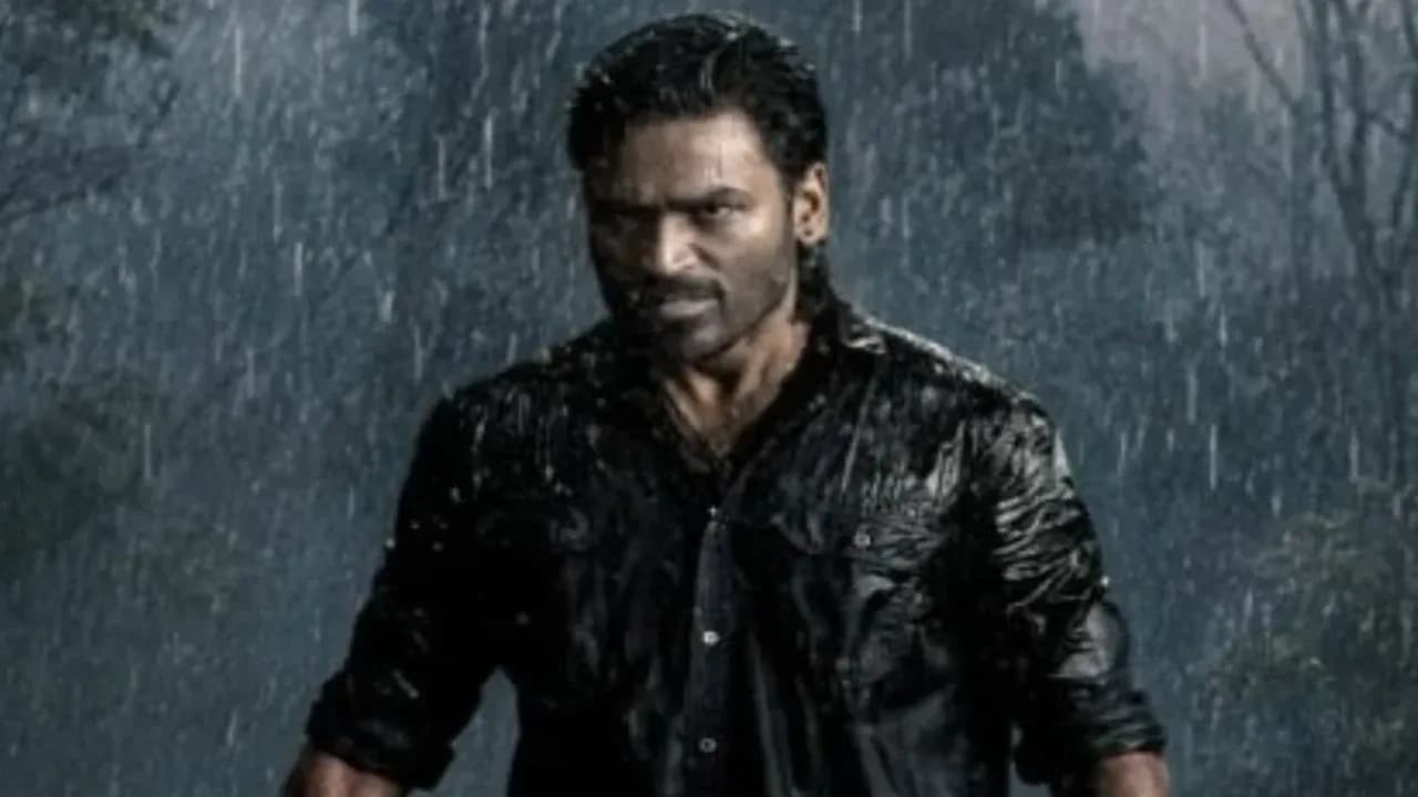 A still from Om: Chapter 1 featuring Dhanush and Mammootty in action poses