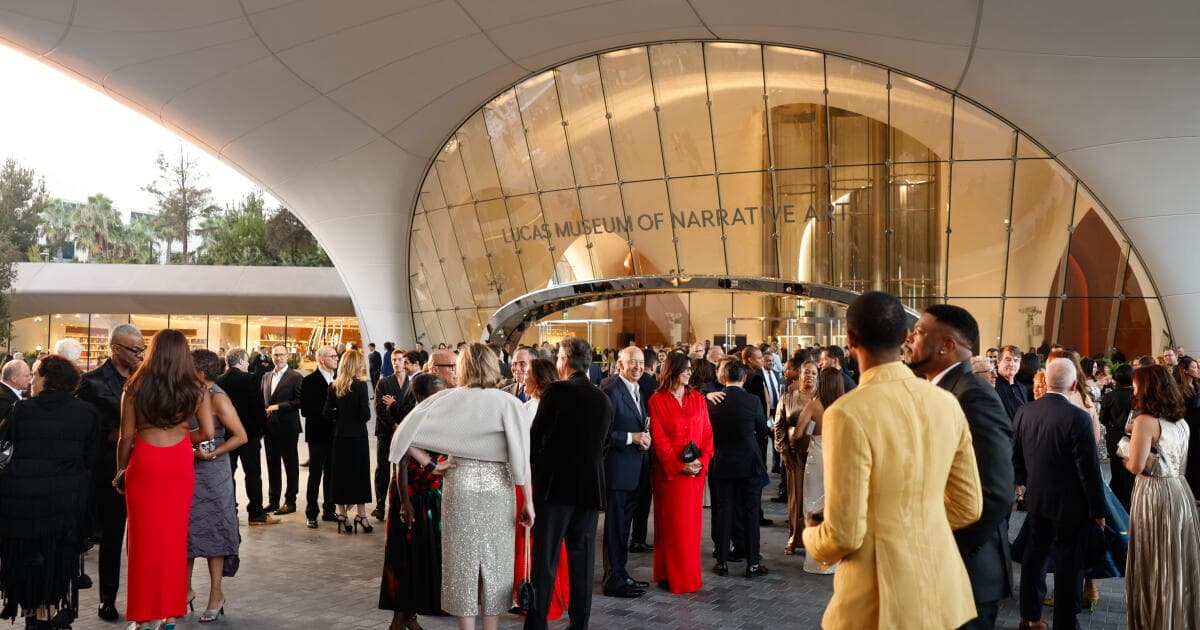 George Lucas greeting Oprah Winfrey and other celebrities at the Lucas Museum opening gala in Los Angeles