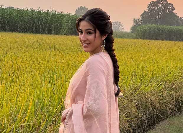 Sara Ali Khan in a blush-pink Punjabi suit, leaning on Ayushmann Khurrana as they ride a tractor in Punjab.