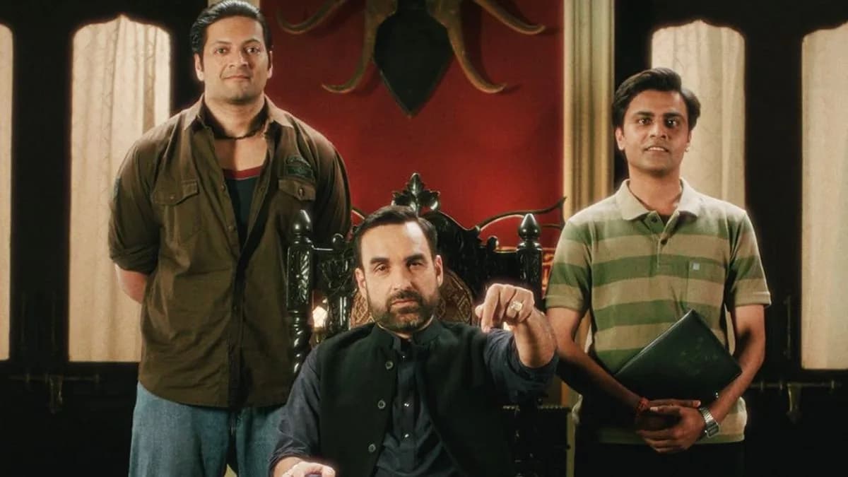 Promotional poster or still from Mirzapur: The Movie showing key cast members against the film's crime-thriller backdrop
