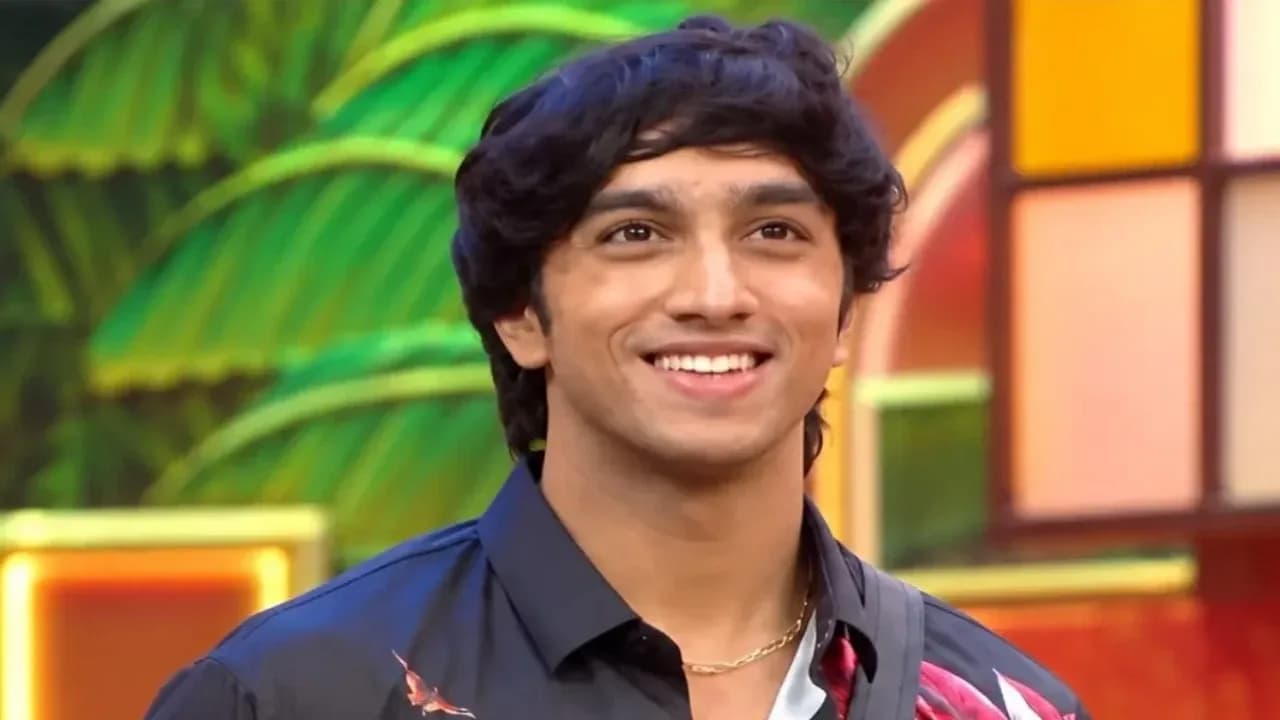 Bigg Boss Telugu 10 house set with contestants during a discussion, hosted by Nagarjuna Akkineni